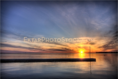 Colorful sunset on Ottawa river by Britannia Yacht Club dock