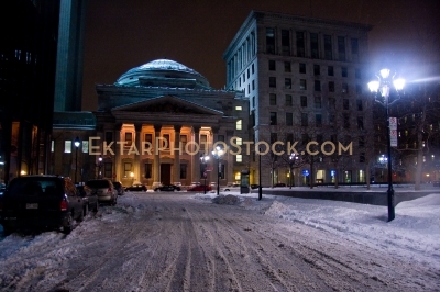Night winter street view in Montreal snow square Notre-Dame