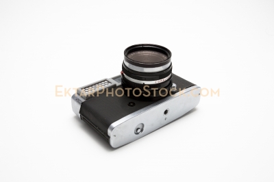 Old film rangefinder camera isolated on white