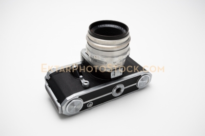 Old film SLR camera isolated on white bottom view