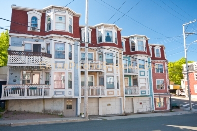 Row of colorful houses on the street of St Johns
