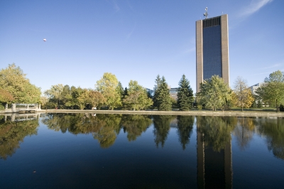 Sky scraper reflection in Rideau Canal by the lock.