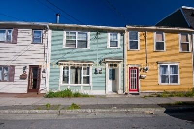 St Johns colorful houses on the street pink cyan orange